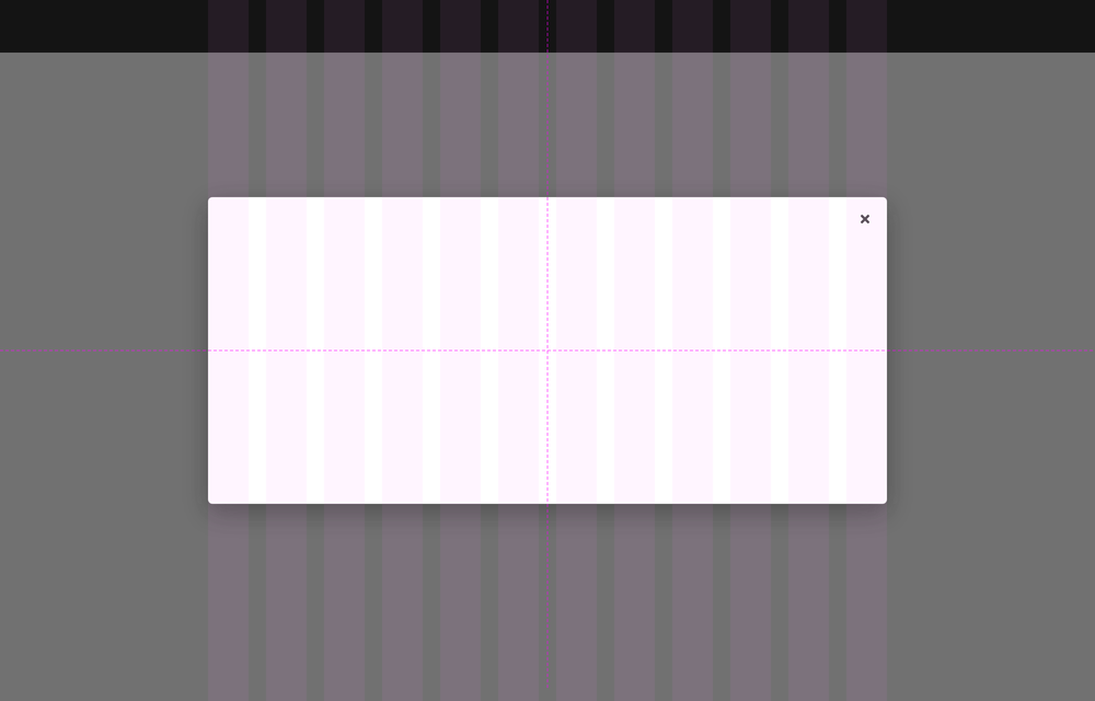 A dialog container spanning a 12-column grid that is fixed in the center of the page